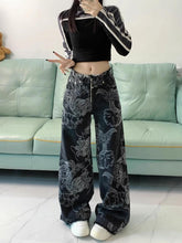 Vaqueros rectos ajustados y estampados